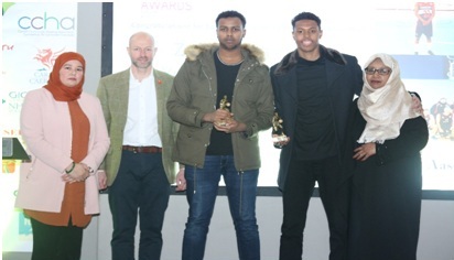 Pictured here is Tom Overton Head of Community Sport at Sport Wales pictured here presenting the Sporting Excellence Award in Basketball to Mohamed Dirie and Yunus Mohamed along with Shakilah Malik Chair of SEF Cymru and Fowzia